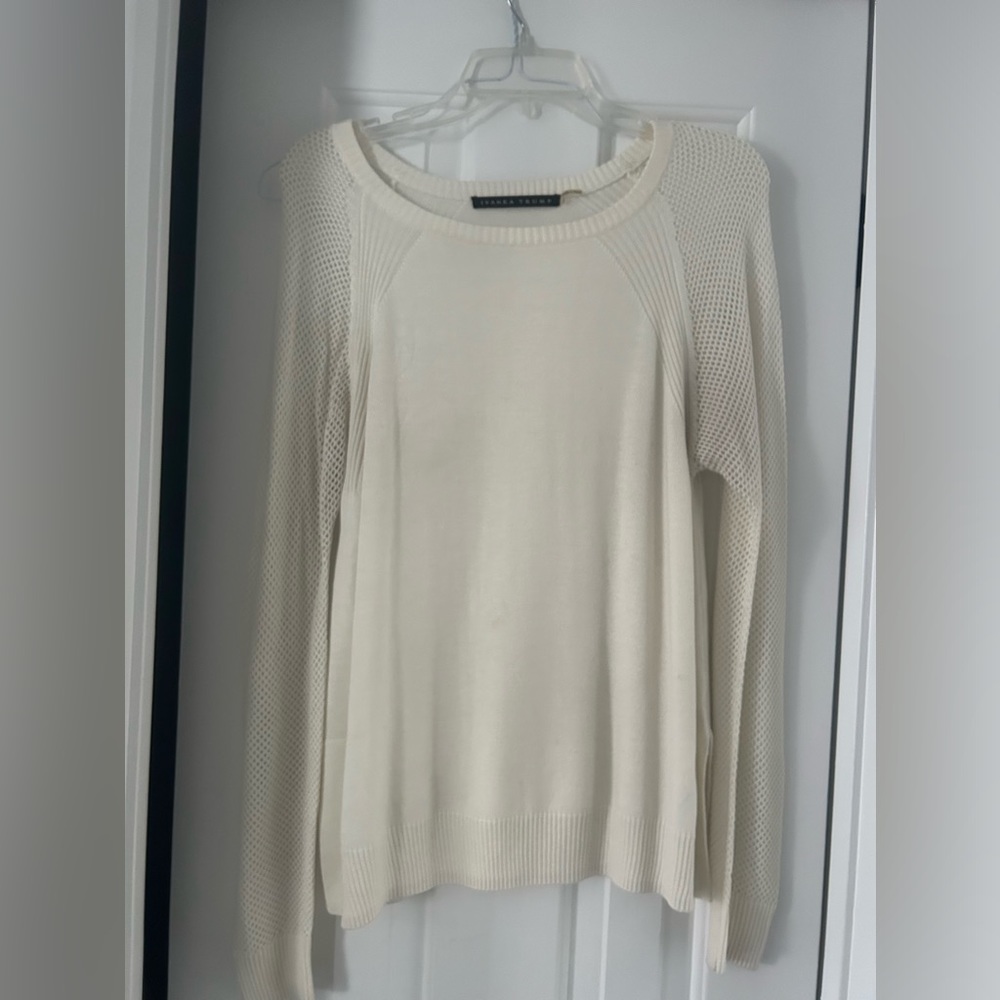 Creme sweater with beautiful arm details. Light weight.
